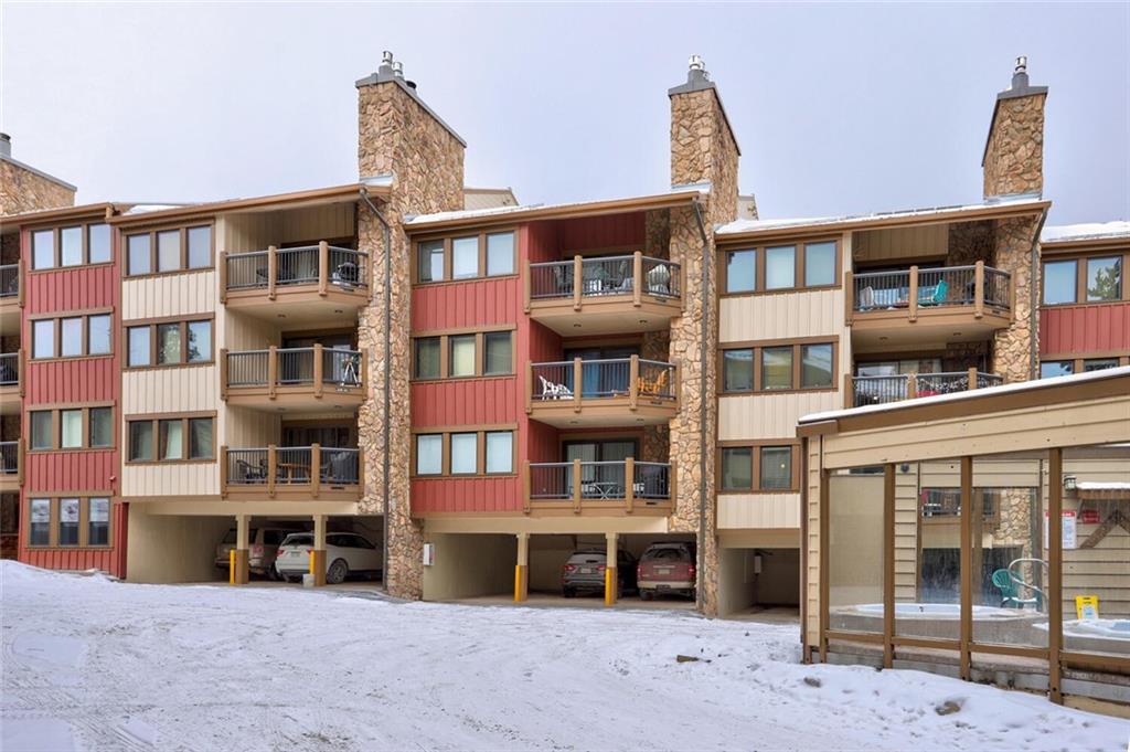 325 Four Oclock Road, Unit C203 Breckenridge, CO 80424 - Photo 34 of 35 a front view of a building with glass windows