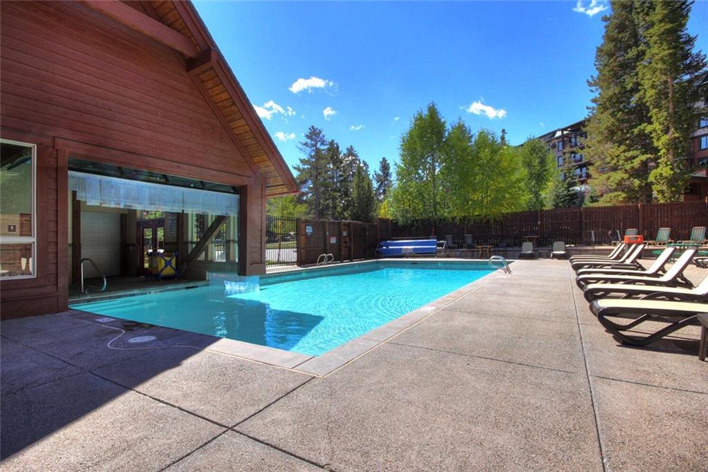 325 Four Oclock Road, Unit C203 Breckenridge, CO 80424 - Photo 8 of 35 a view of a backyard with sitting area