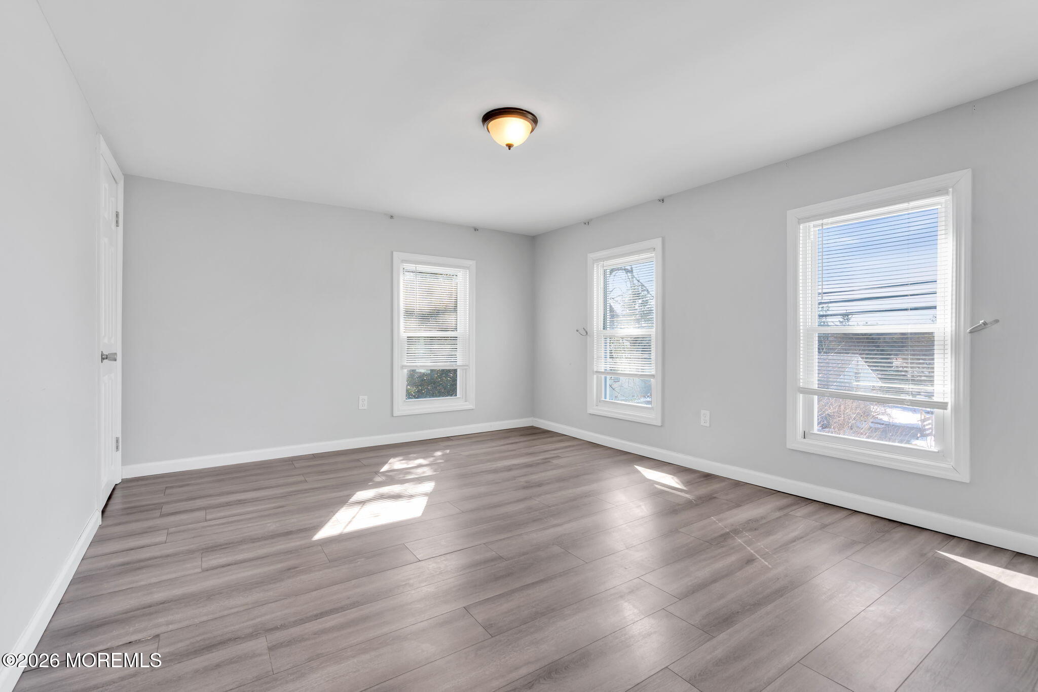 367 South Green Street Tuckerton, NJ 08087 - Photo 18 of 41 an empty room with wooden floor and windows