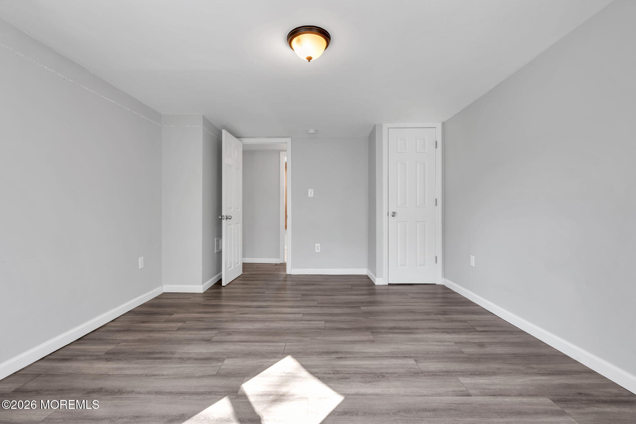 367 South Green Street Tuckerton, NJ 08087 - Photo 22 of 41 a view of an empty room with wooden floor and window