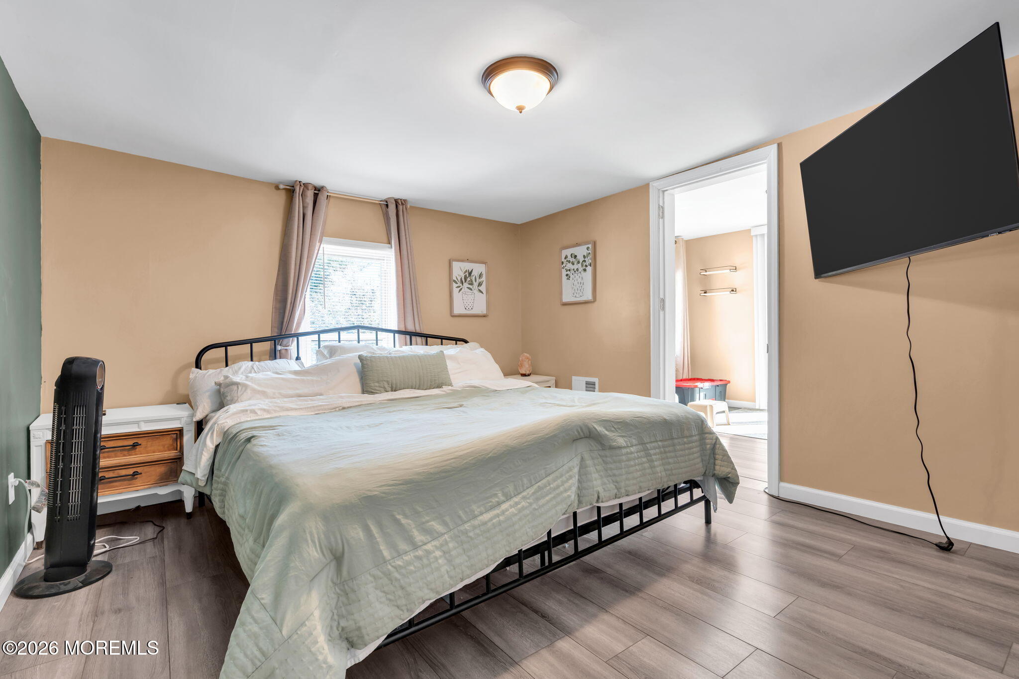 367 South Green Street Tuckerton, NJ 08087 - Photo 25 of 41 a bedroom with a bed and a flat tv screen on dresser