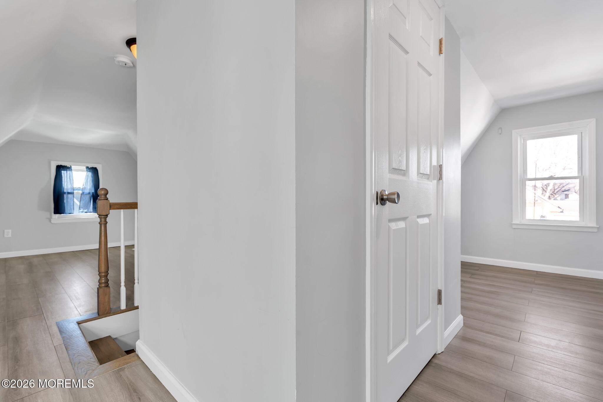 367 South Green Street Tuckerton, NJ 08087 - Photo 32 of 41 a view of a hallway with wooden floor and a bathroom