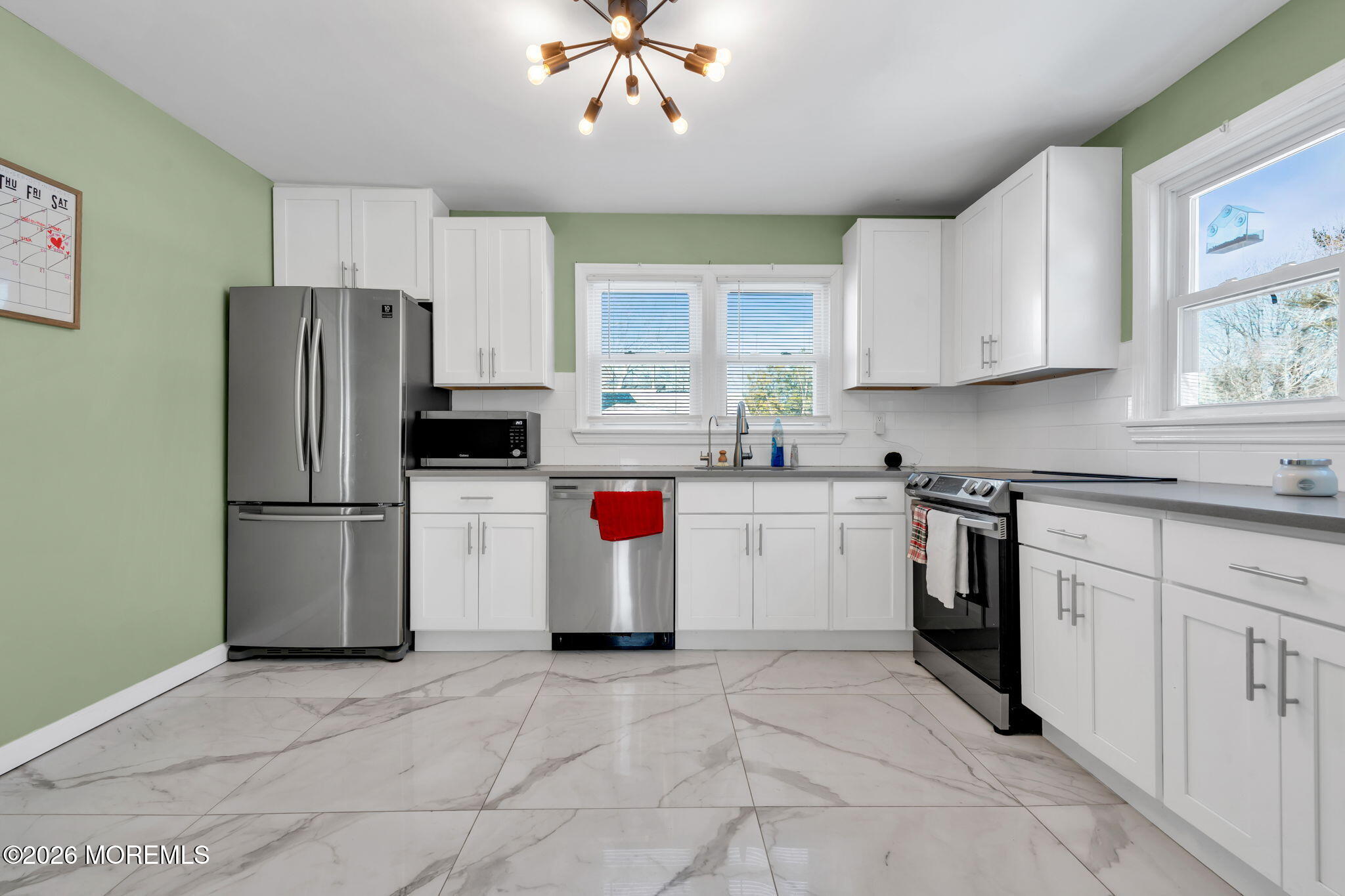 367 South Green Street Tuckerton, NJ 08087 - Photo 4 of 41 a kitchen with a refrigerator sink and cabinets