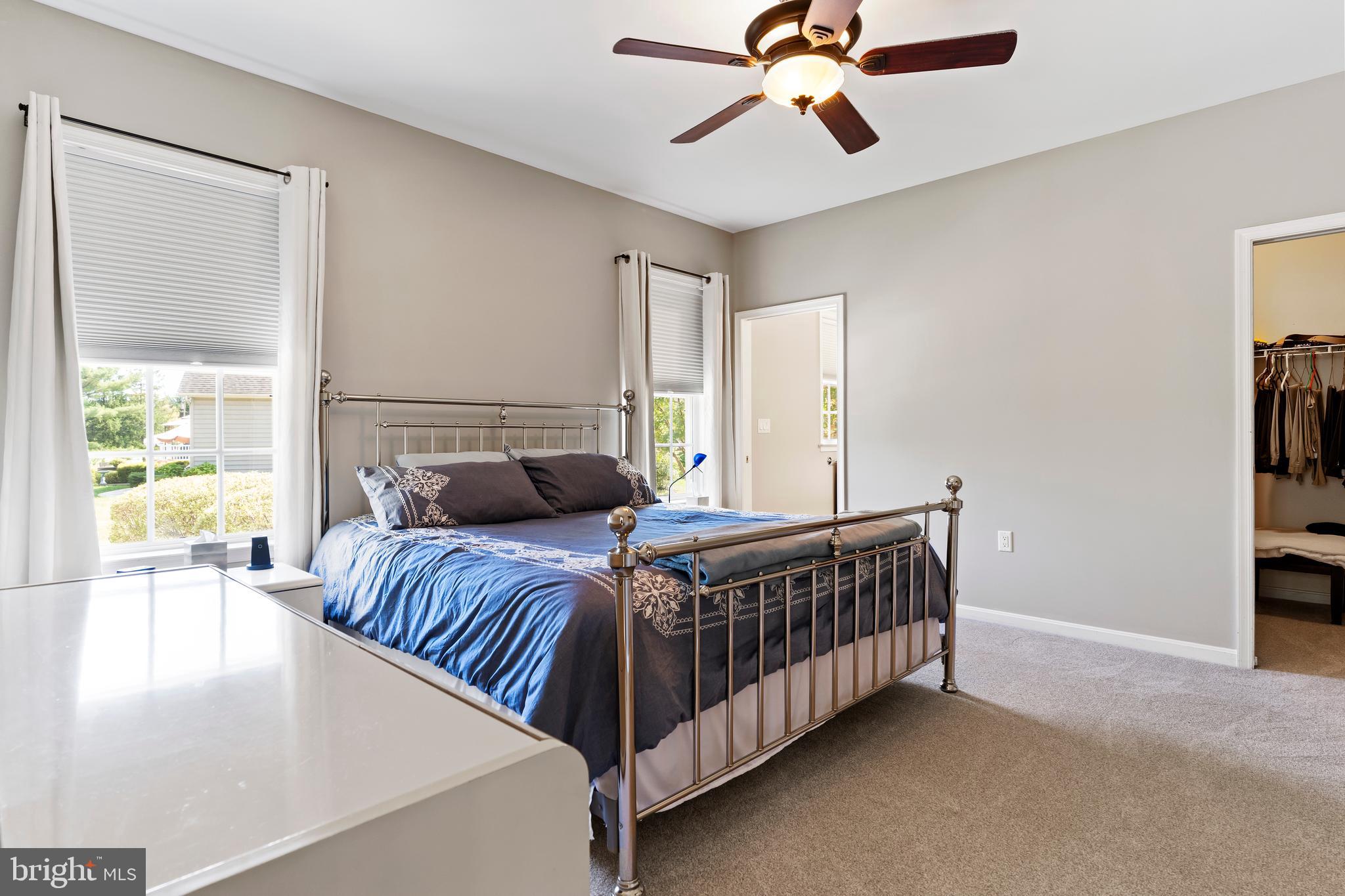 152 St Michaels Way Hanover, PA 17331 - Photo 23 of 37 a bed sitting in a bedroom next to a window