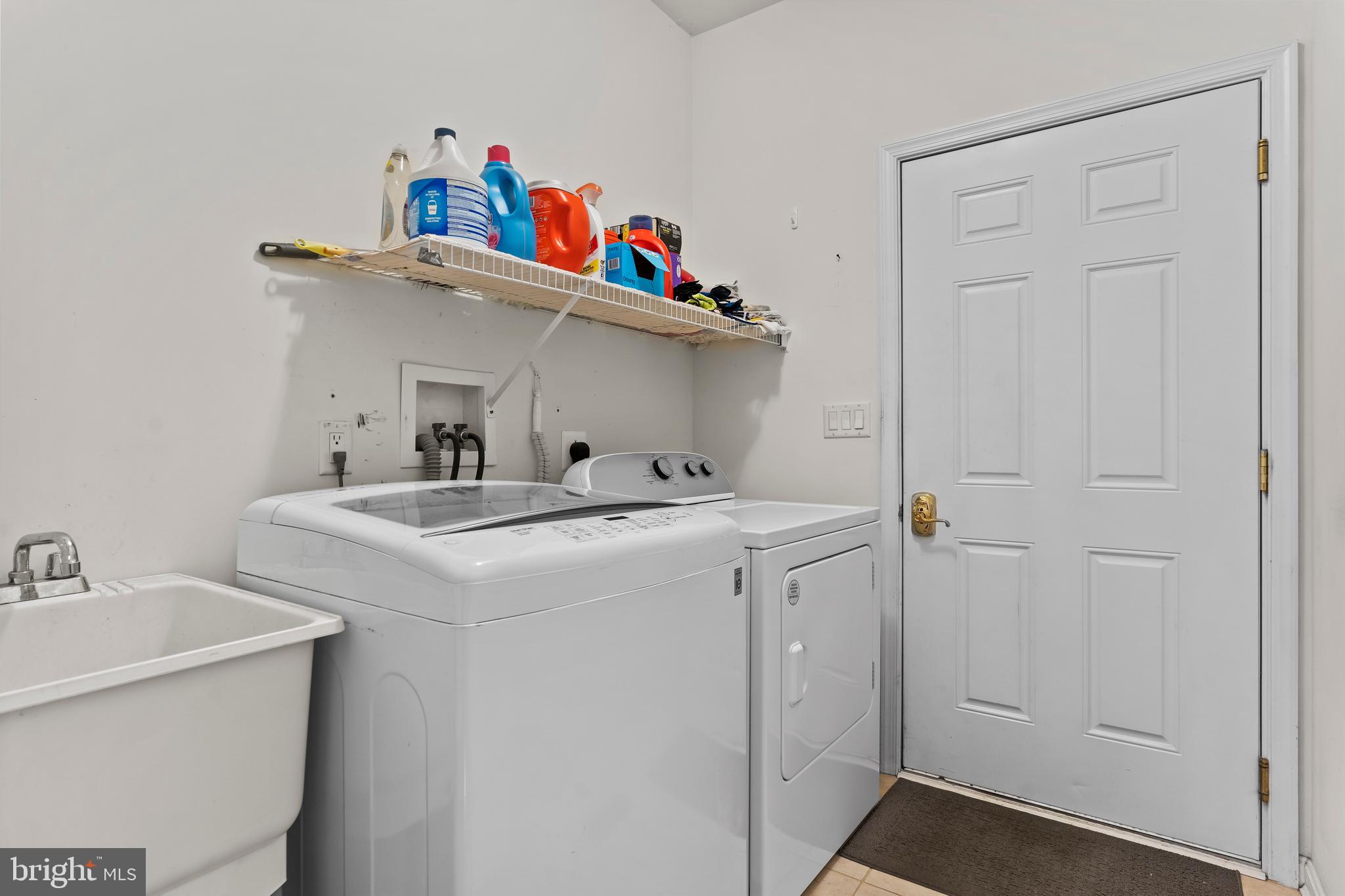 152 St Michaels Way Hanover, PA 17331 - Photo 9 of 37 a utility room with dryer and washer