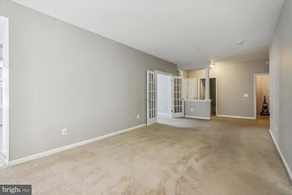 an empty room with windows