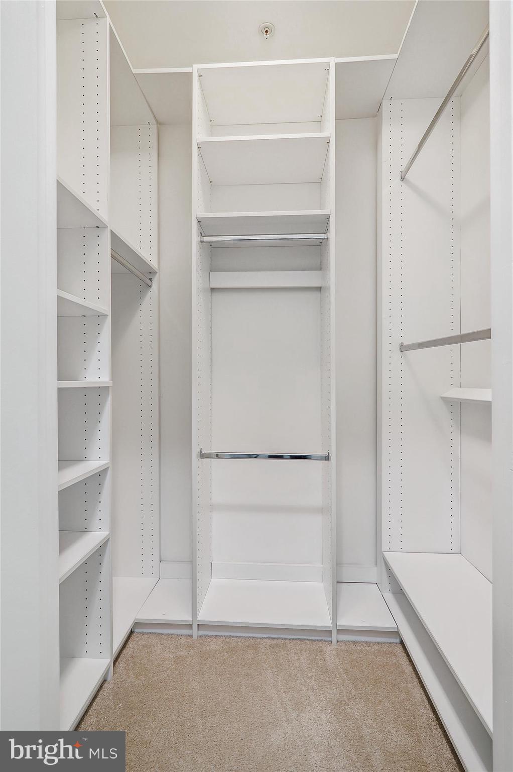 13851 Belle Chasse Boulevard, Unit 213 Laurel, MD 20707 - Photo 25 of 54 a view of an empty walk in closet