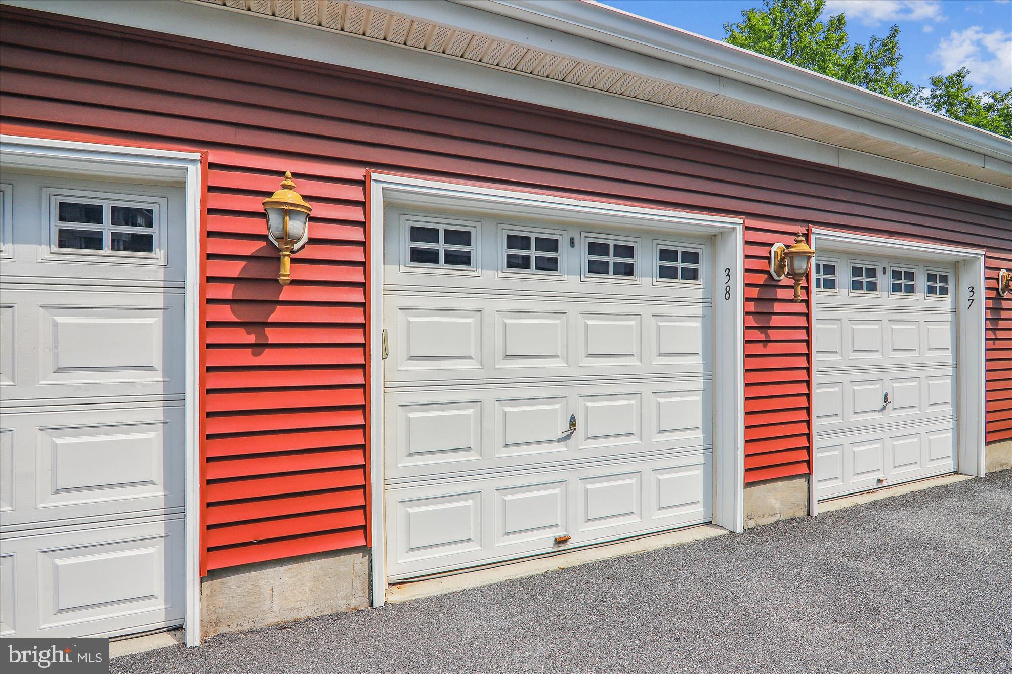 13851 Belle Chasse Boulevard, Unit 213 Laurel, MD 20707 - Photo 31 of 54 a front view of a house with a yard