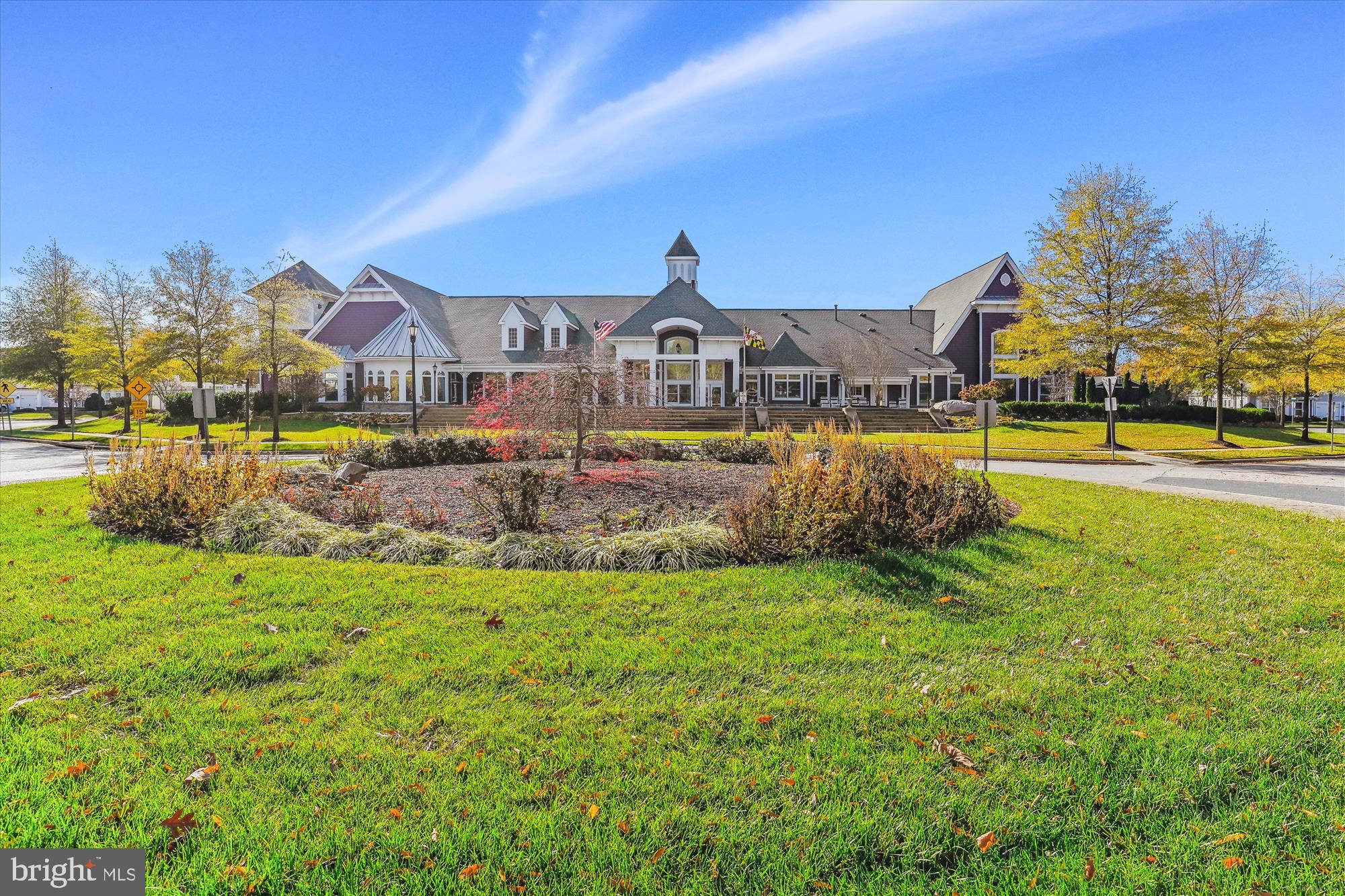 13851 Belle Chasse Boulevard, Unit 213 Laurel, MD 20707 - Photo 38 of 54 a front view of a house with a big yard