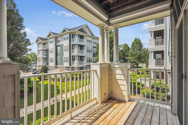 a view of a brick building from a balcony