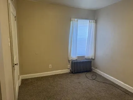 an empty room with a door