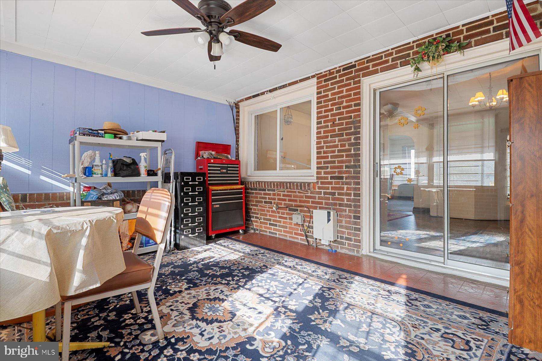 179 West Meadow Road Baltimore, MD 21225 - Photo 17 of 34 a view of a workspace with furniture