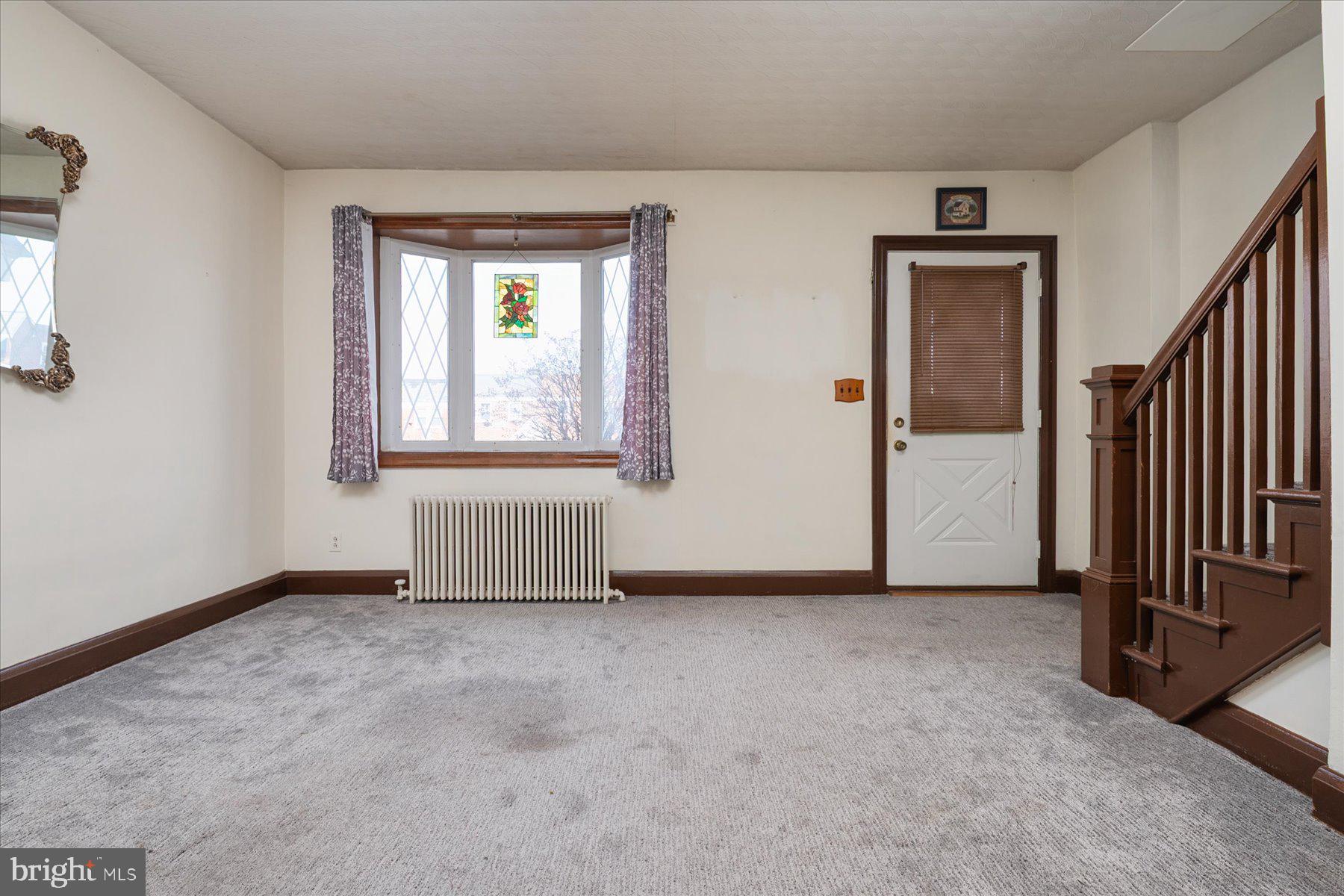179 West Meadow Road Baltimore, MD 21225 - Photo 7 of 34 an empty room with windows