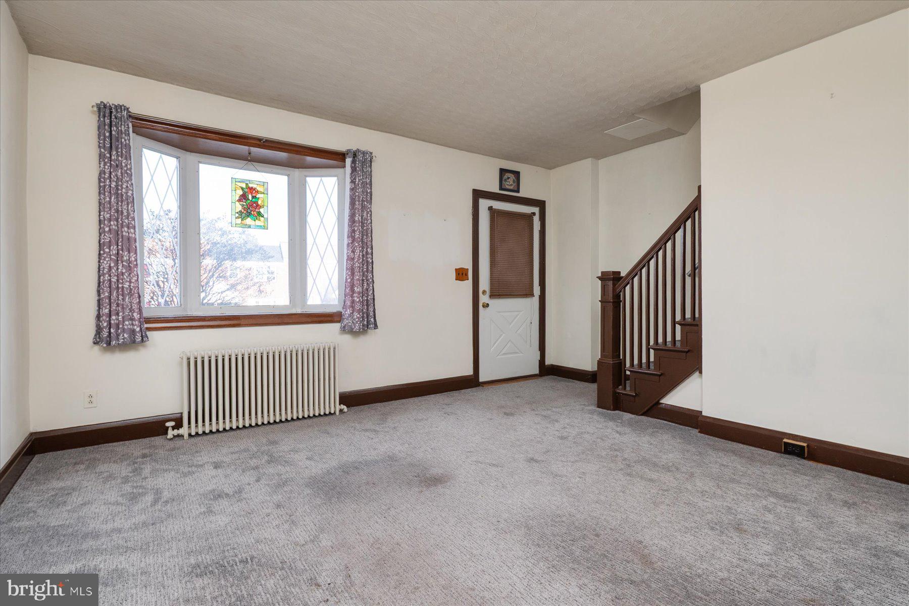 179 West Meadow Road Baltimore, MD 21225 - Photo 9 of 34 an empty room with windows