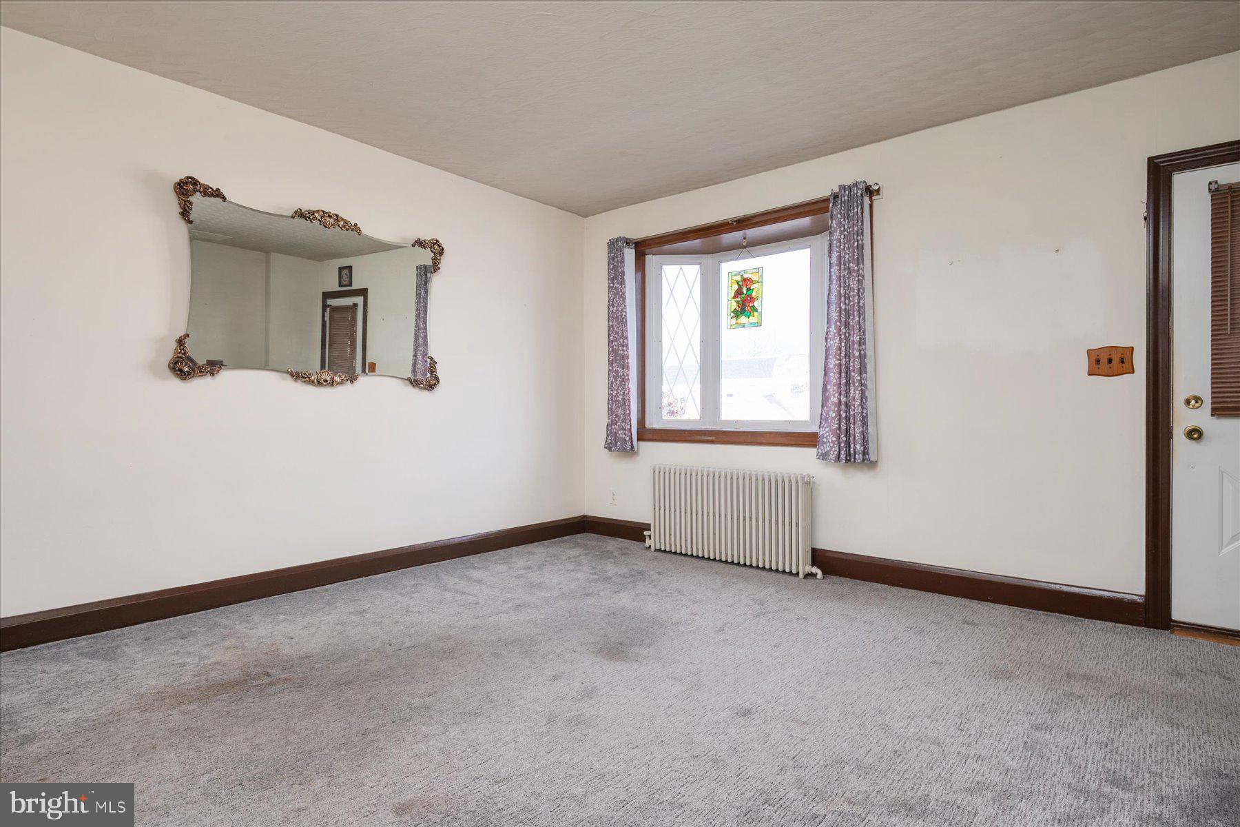 179 West Meadow Road Baltimore, MD 21225 - Photo 10 of 34 an empty room with windows