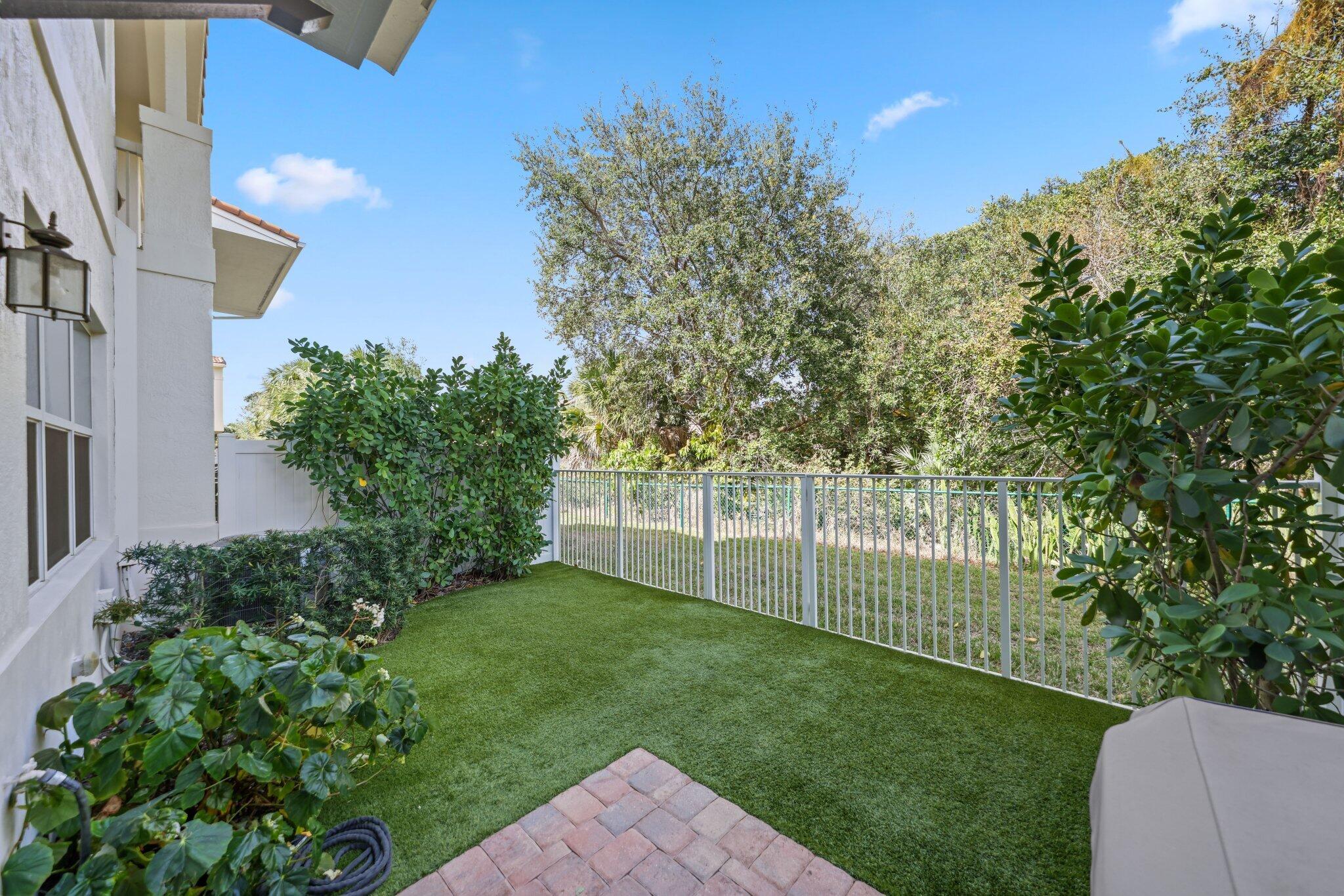 100 Northwest 69th Circle, Unit 24 Boca Raton, FL 33487 - Photo 41 of 61 turfed backyard