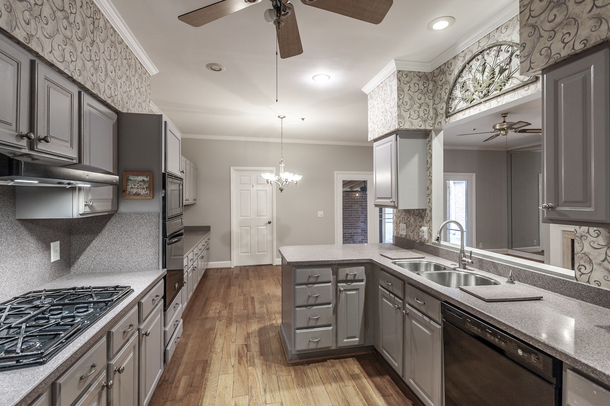 3 Wyndermere Road Hendersonville, TN 37075 - Photo 11 of 42 a large kitchen with a lot of cabinets a stove a sink and dishwasher
