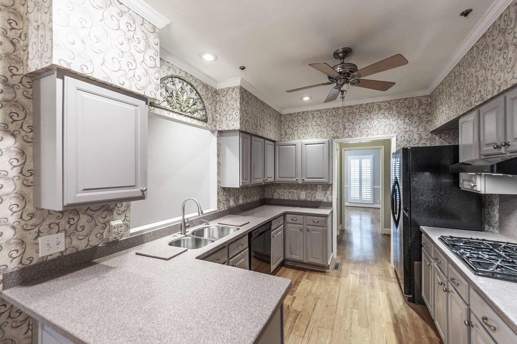 3 Wyndermere Road Hendersonville, TN 37075 - Photo 14 of 42 a kitchen with stainless steel appliances granite countertop a sink stove and refrigerator