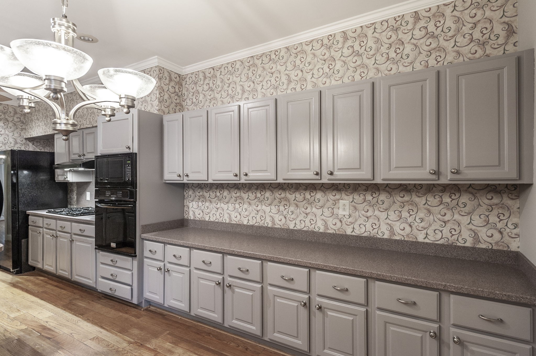 3 Wyndermere Road Hendersonville, TN 37075 - Photo 18 of 42 a kitchen with granite countertop white cabinets and stainless steel appliances