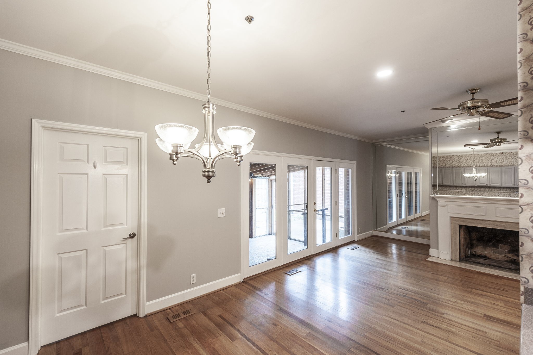 3 Wyndermere Road Hendersonville, TN 37075 - Photo 20 of 42 a view of a livingroom with a fireplace wooden floor and chandelier