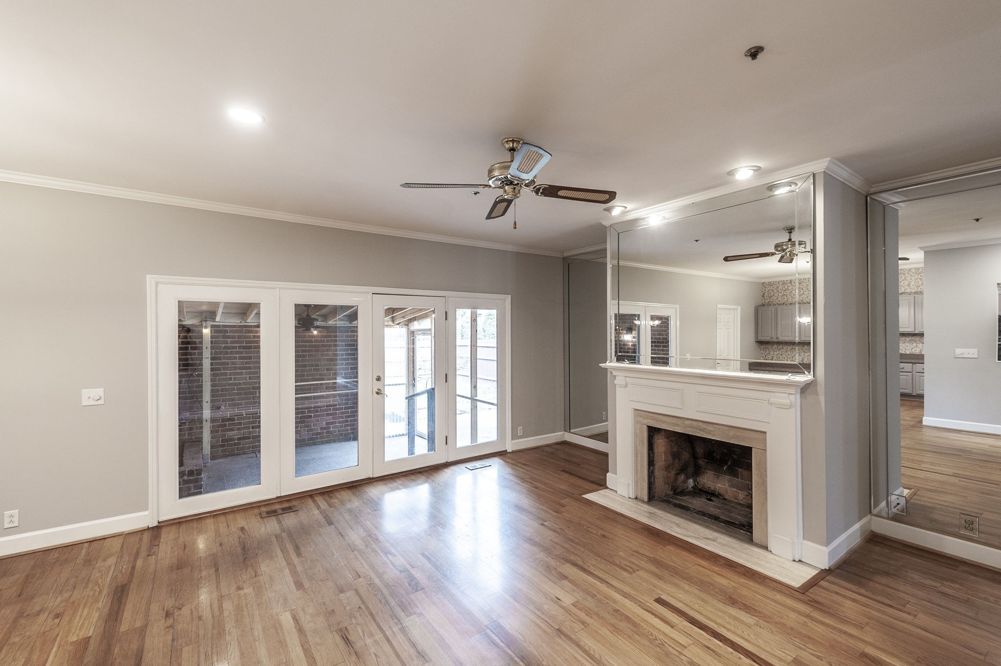 3 Wyndermere Road Hendersonville, TN 37075 - Photo 23 of 42 a view of a livingroom with wooden floor and a fireplace