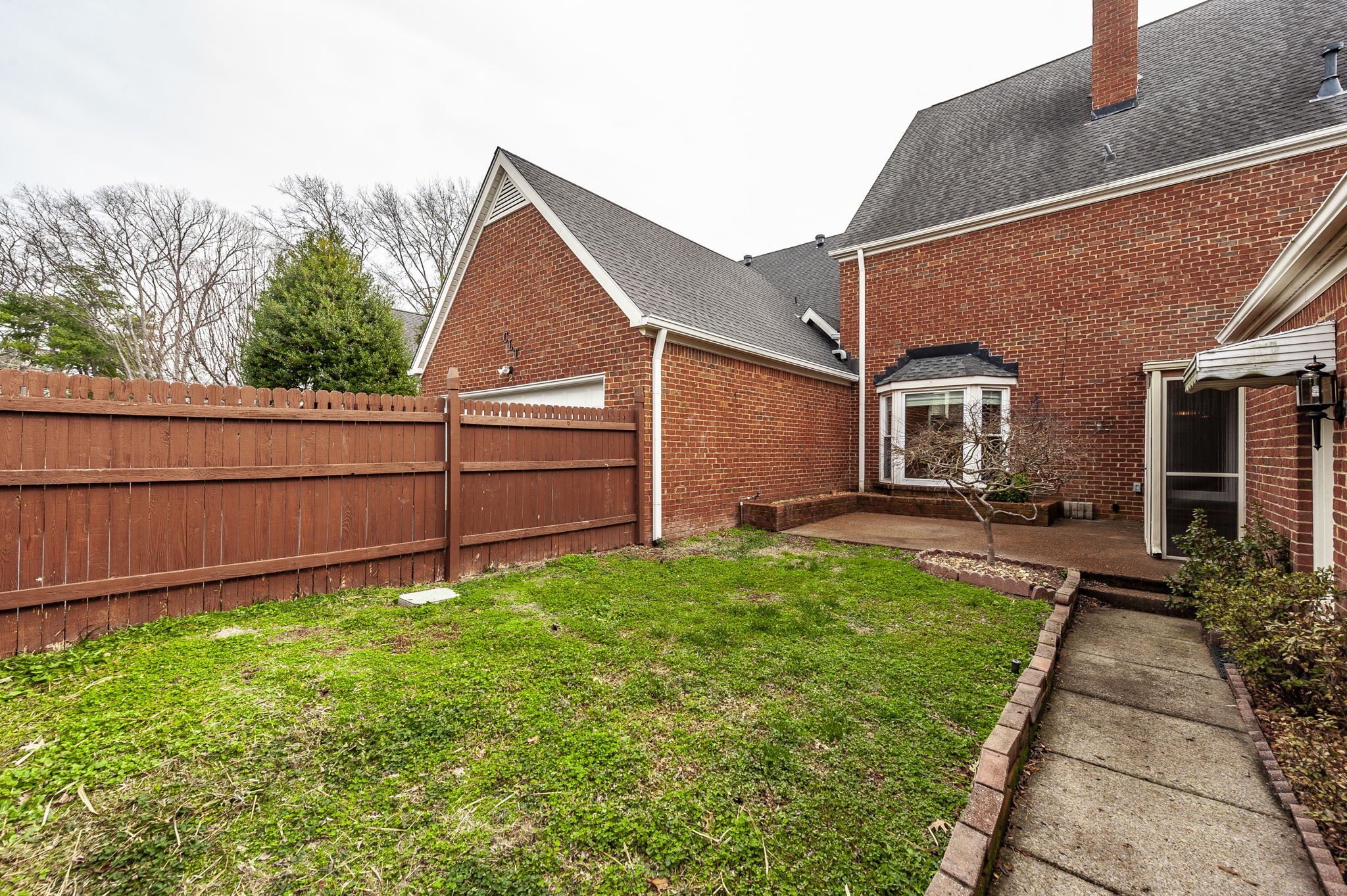 3 Wyndermere Road Hendersonville, TN 37075 - Photo 40 of 42 a view of backyard with a garden and deck