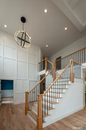 a view of entryway with wooden floor