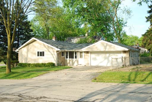 715 Palatine Road Palatine, IL 60067 - Photo 1 of 1 a front view of a house with a yard