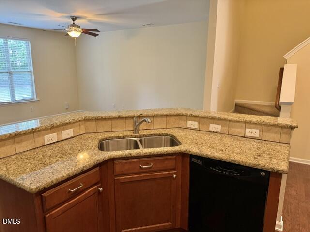 8227 Primanti Boulevard Raleigh, NC 27612 - Photo 11 of 25 a kitchen with a sink and a cabinets