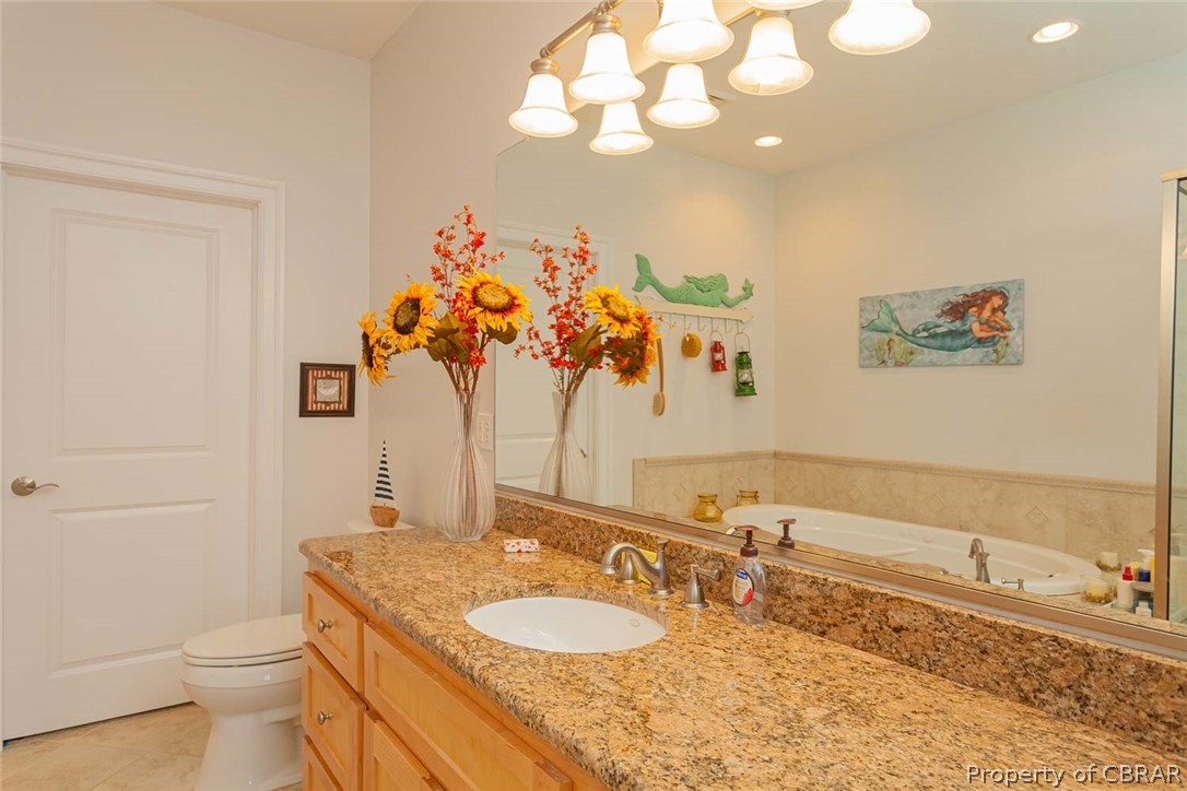 102 Ferry Road Hartfield, VA 23071 - Photo 35 of 42 Master Vanity with granite countertops on the solid maple cabinet
