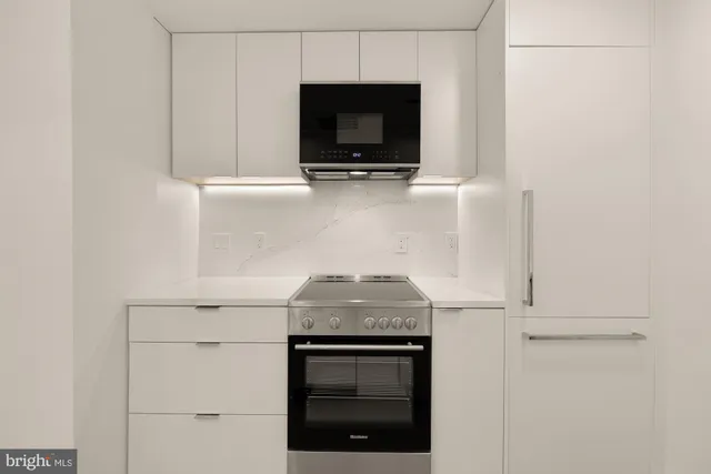 a view of storage and utility room with a sink