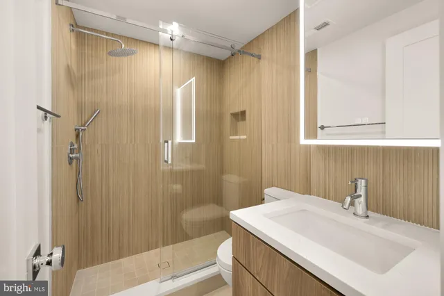 a bathroom with a sink and a toilet