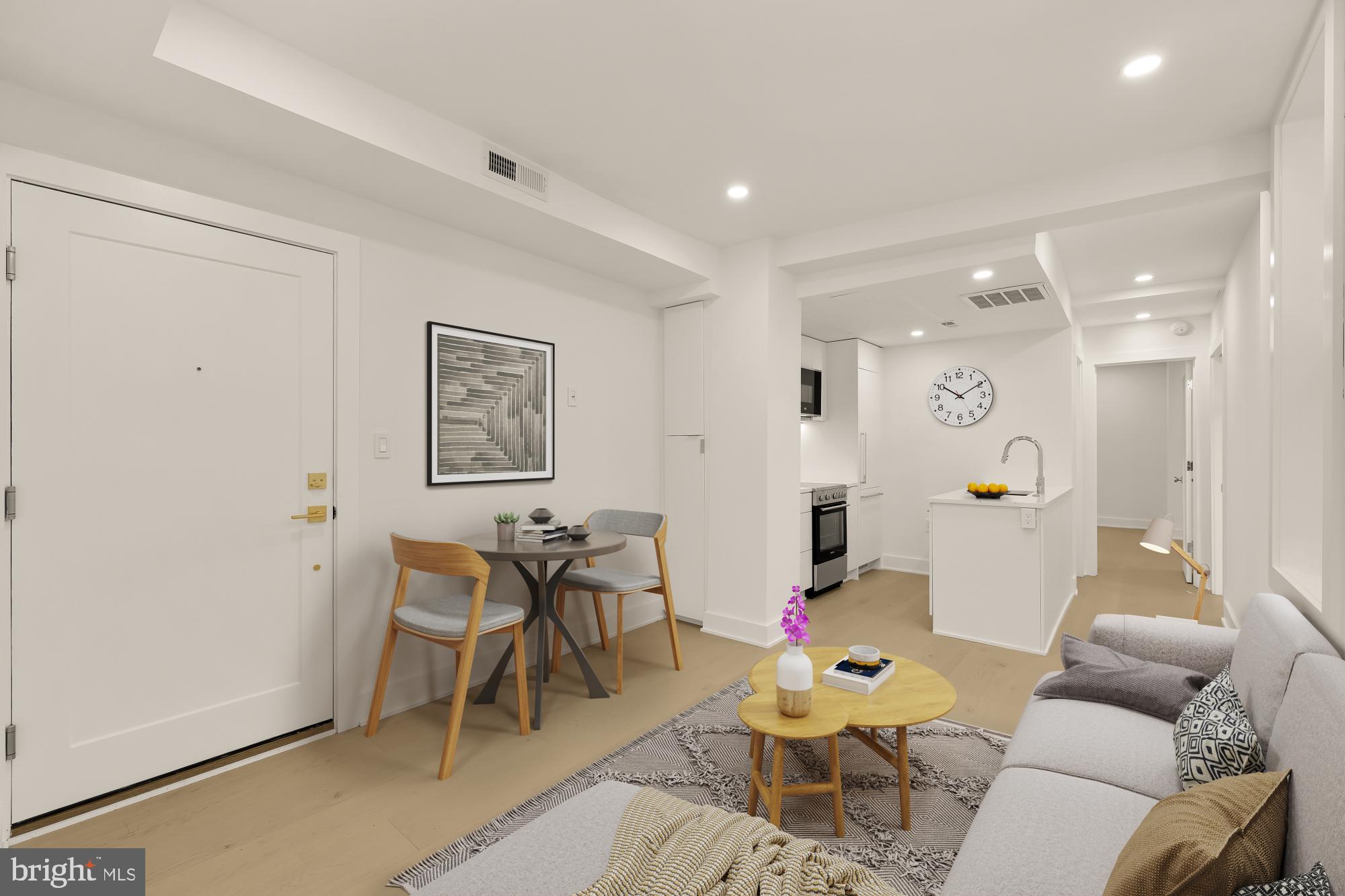 2116 Kalorama Road Northwest, Unit 104 Washington, DC 20008 - Photo 2 of 33 a living room with furniture and wooden floor