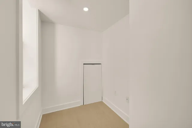 a kitchen with a sink a stove and oven