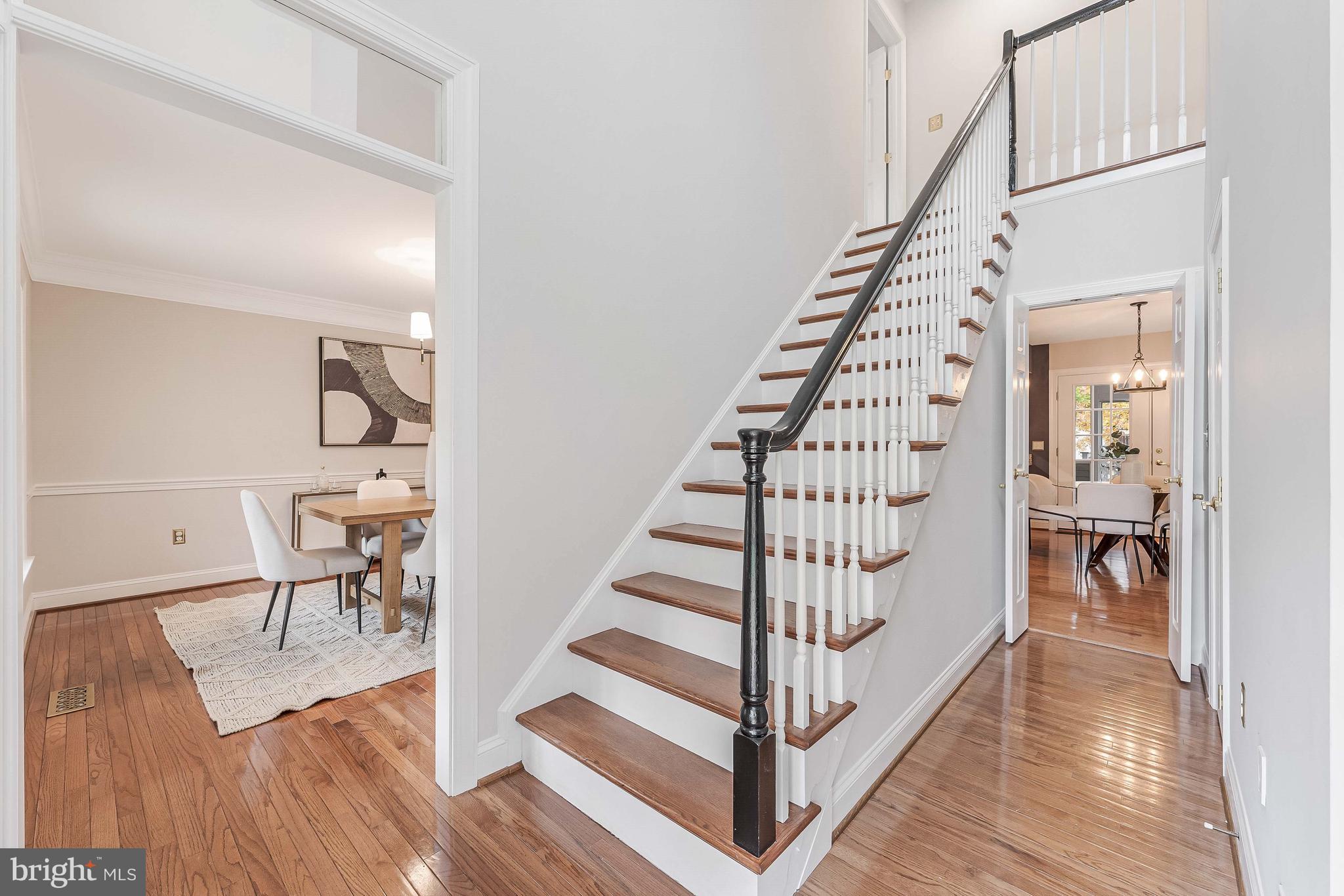 8926 Jameson Street Lorton, VA 22079 - Photo 15 of 32 a view of entryway and hall with wooden floor