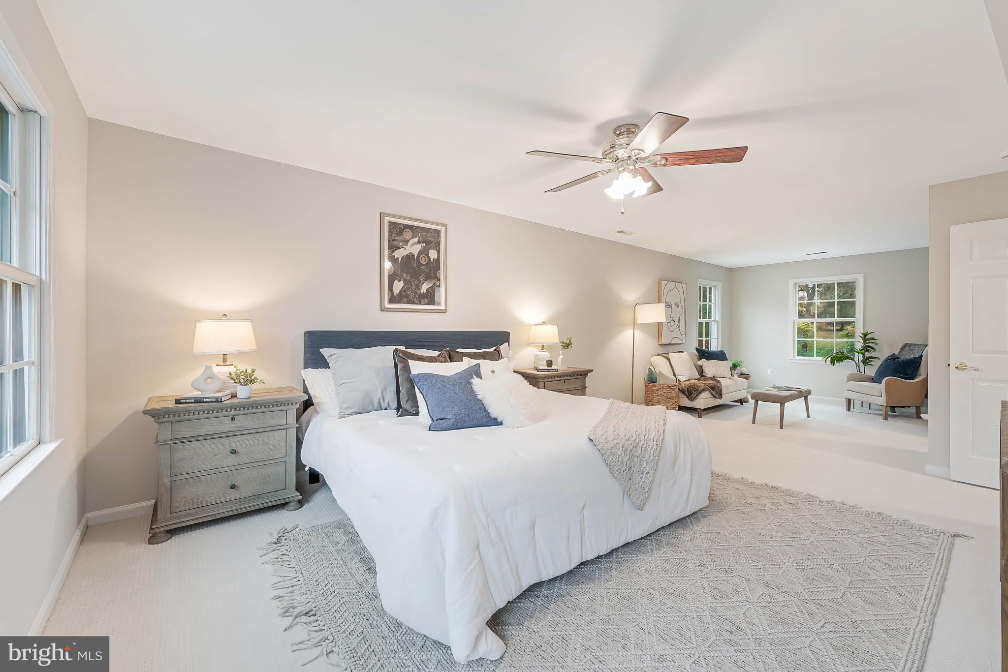 8926 Jameson Street Lorton, VA 22079 - Photo 17 of 32 a bedroom with bed and window