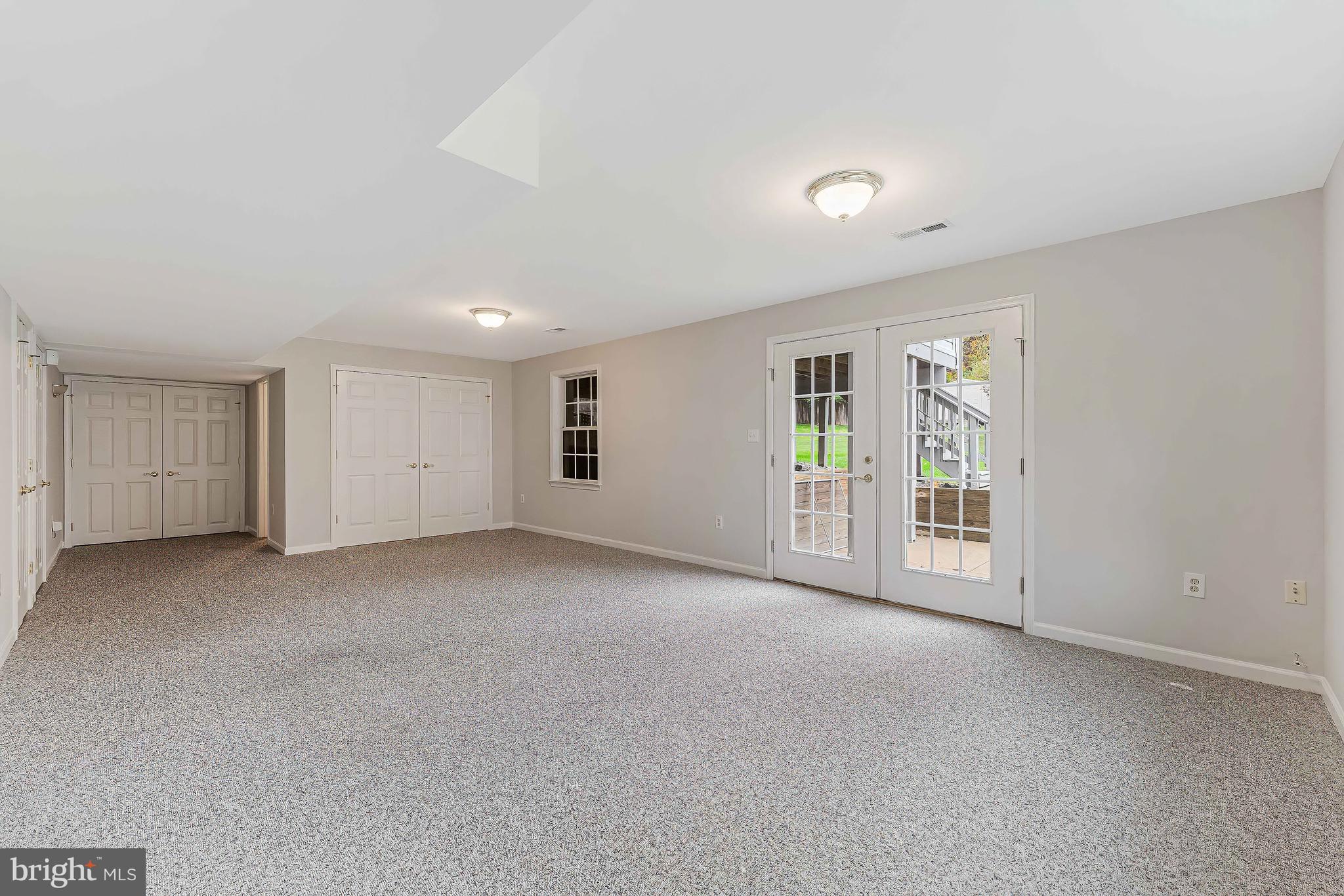 8926 Jameson Street Lorton, VA 22079 - Photo 28 of 32 a view of an empty room with a fireplace