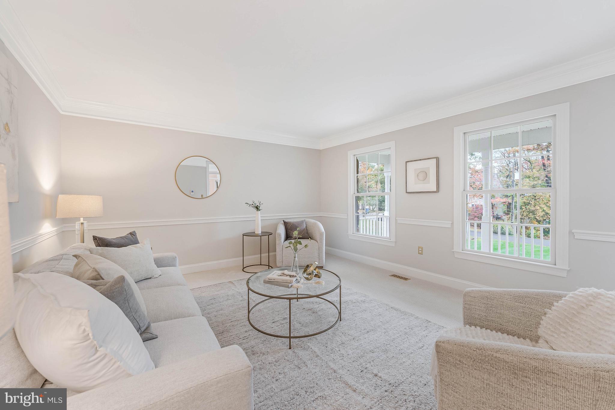 8926 Jameson Street Lorton, VA 22079 - Photo 3 of 32 a living room with furniture and a window