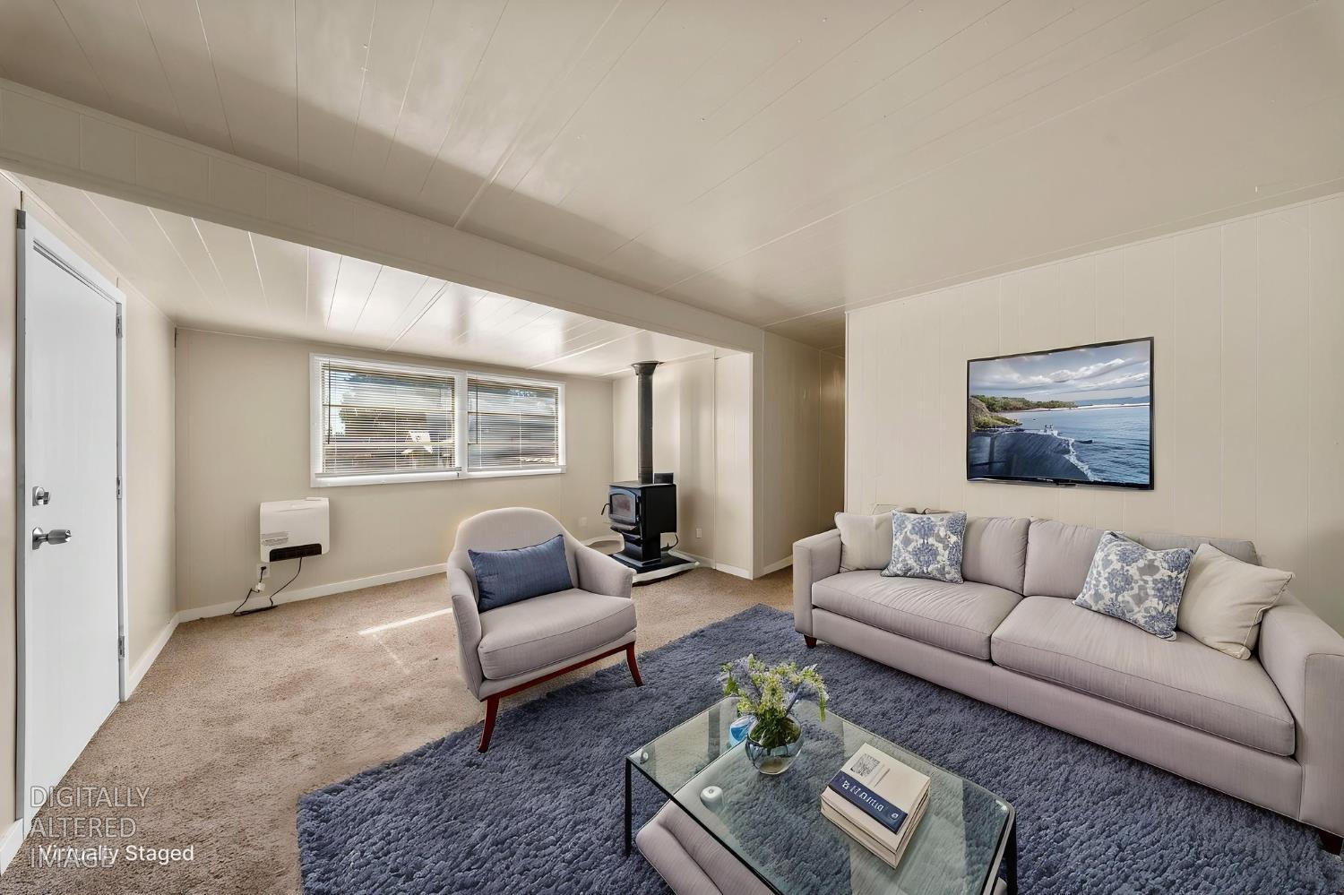4482 Moran Road, Unit 12 Avery, CA 95224 - Photo 11 of 21 a living room with furniture and a window
