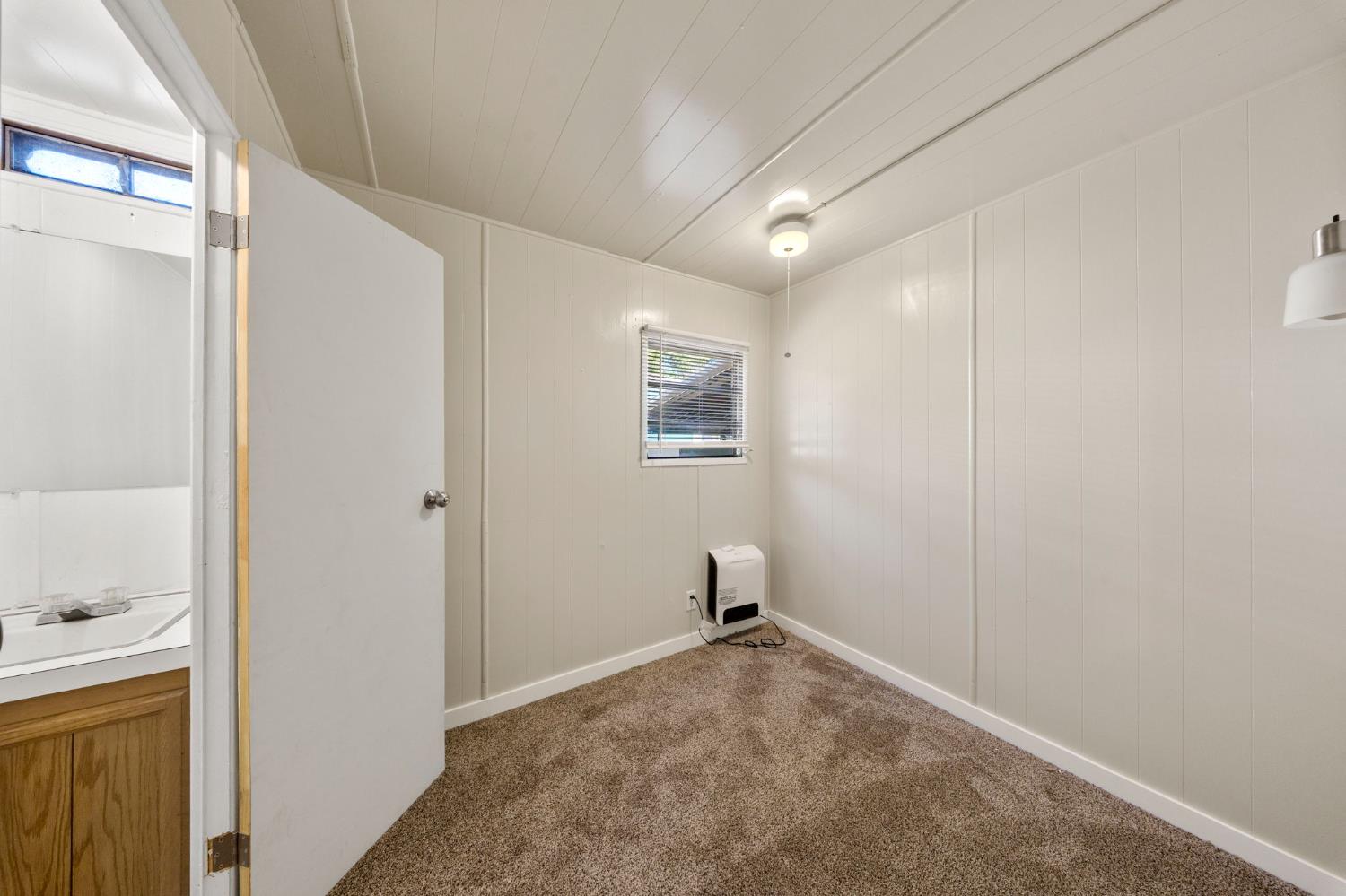 4482 Moran Road, Unit 12 Avery, CA 95224 - Photo 14 of 21 a view of a hallway to rooms