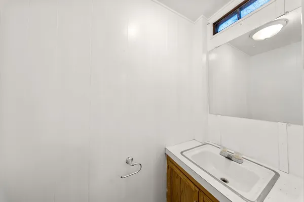 a view of room with shower and a yard