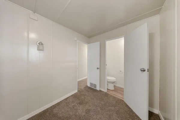 a view of room with workspace and window