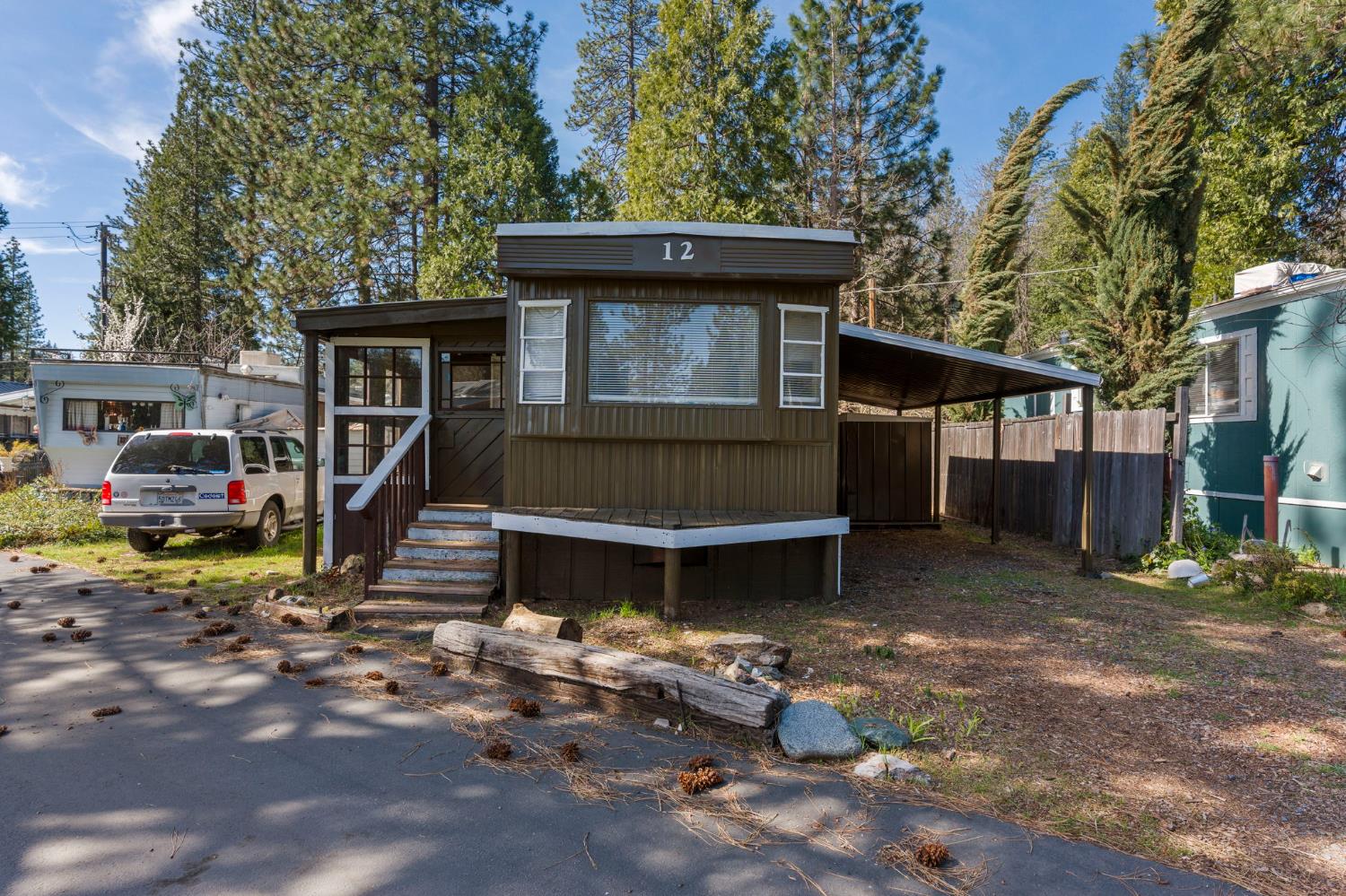 4482 Moran Road, Unit 12 Avery, CA 95224 - Photo 5 of 21 a front view of a house with a garden