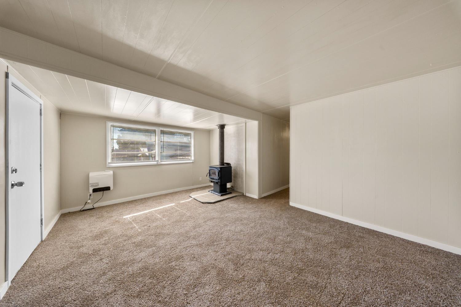 4482 Moran Road, Unit 12 Avery, CA 95224 - Photo 10 of 21 an empty room with windows