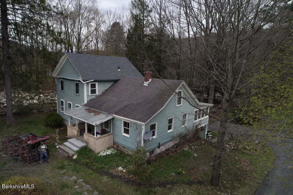 1138 Main Road Stamford, VT 05352 - Photo 2 of 46 front view of a house with a yard
