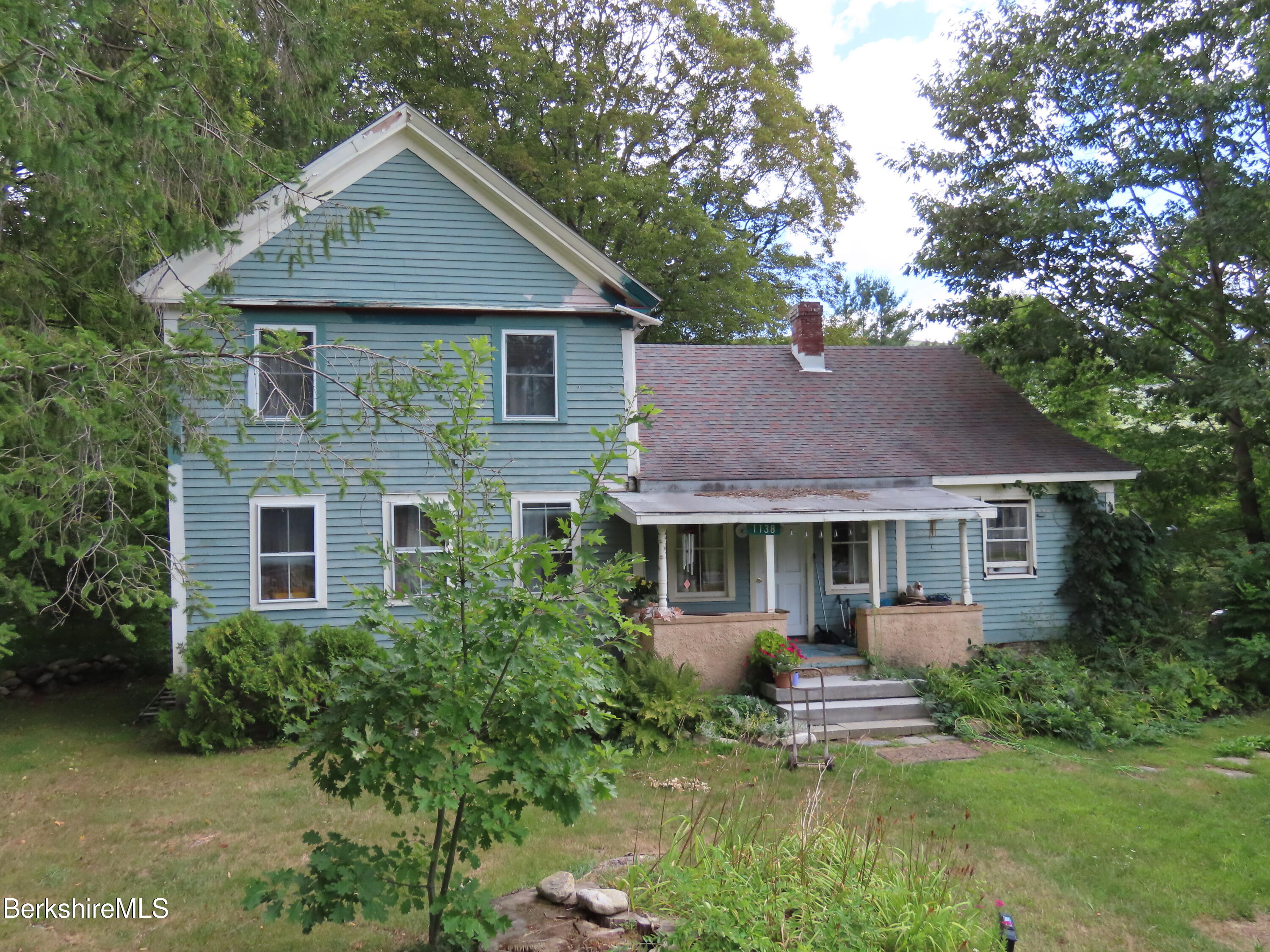 1138 Main Road Stamford, VT 05352 - Photo 25 of 46 a front view of a house with a yard