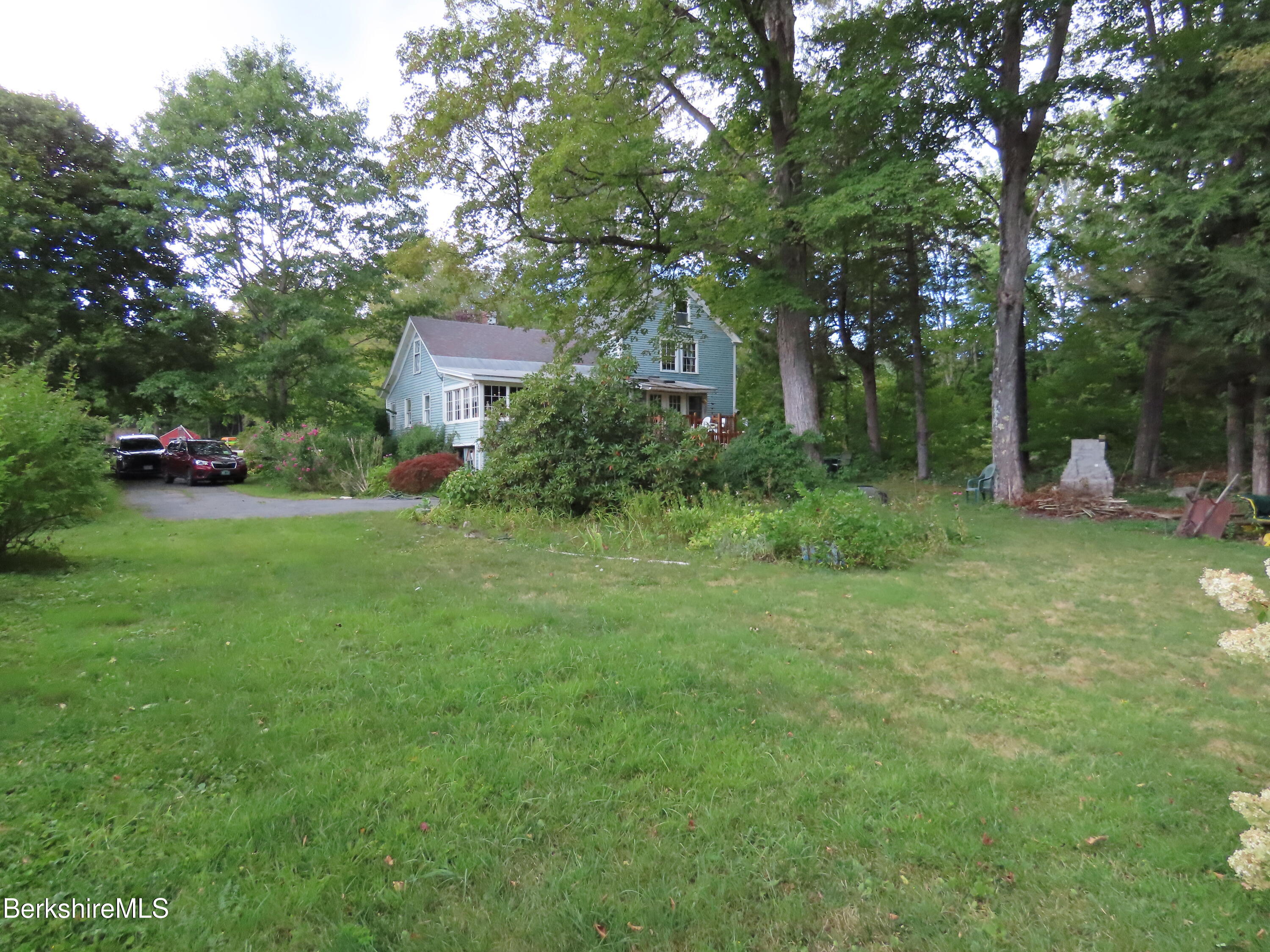 1138 Main Road Stamford, VT 05352 - Photo 34 of 46 a view of a garden with trees