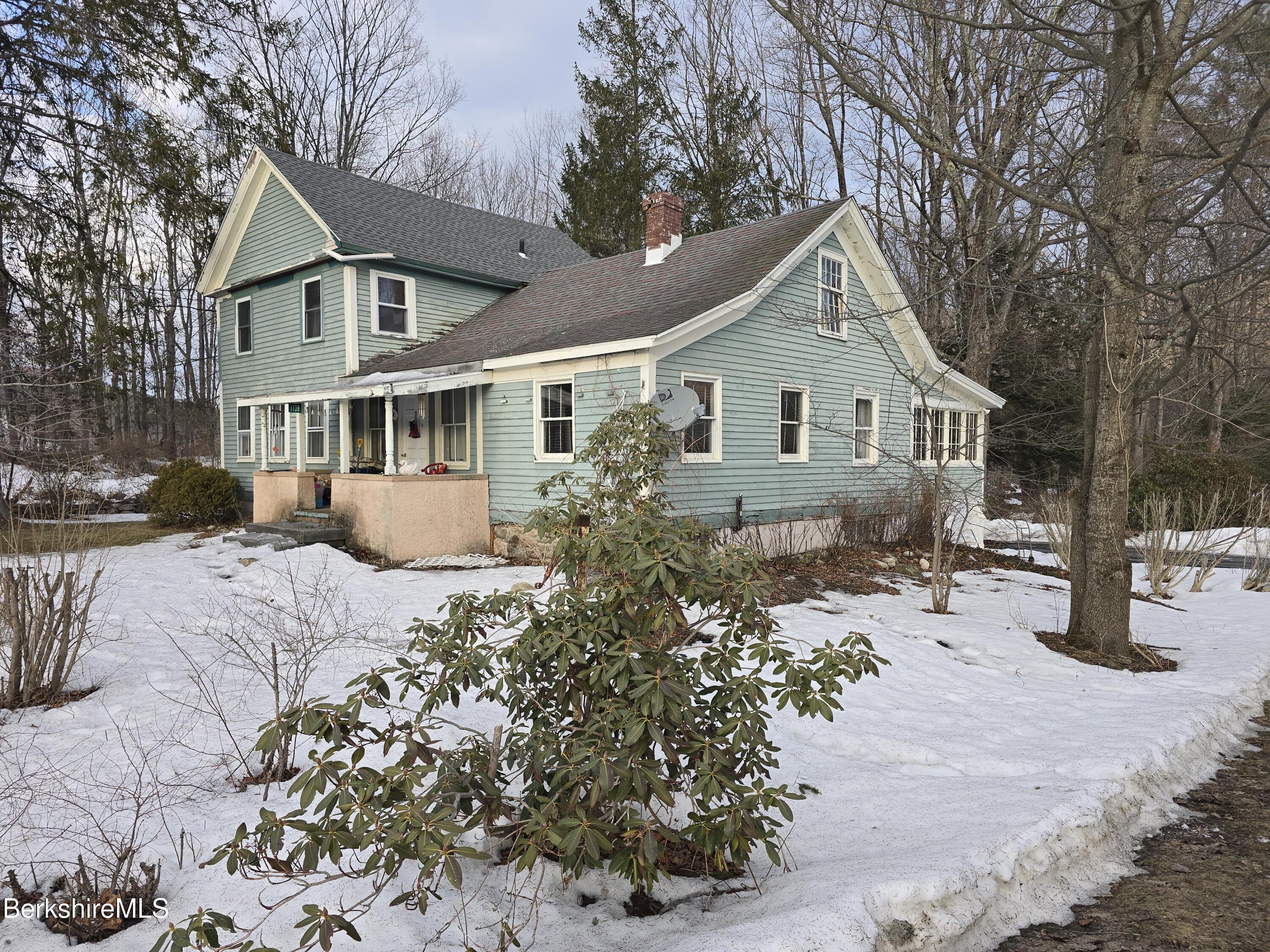 1138 Main Road Stamford, VT 05352 - Photo 40 of 46 a front view of house with yard and trees around