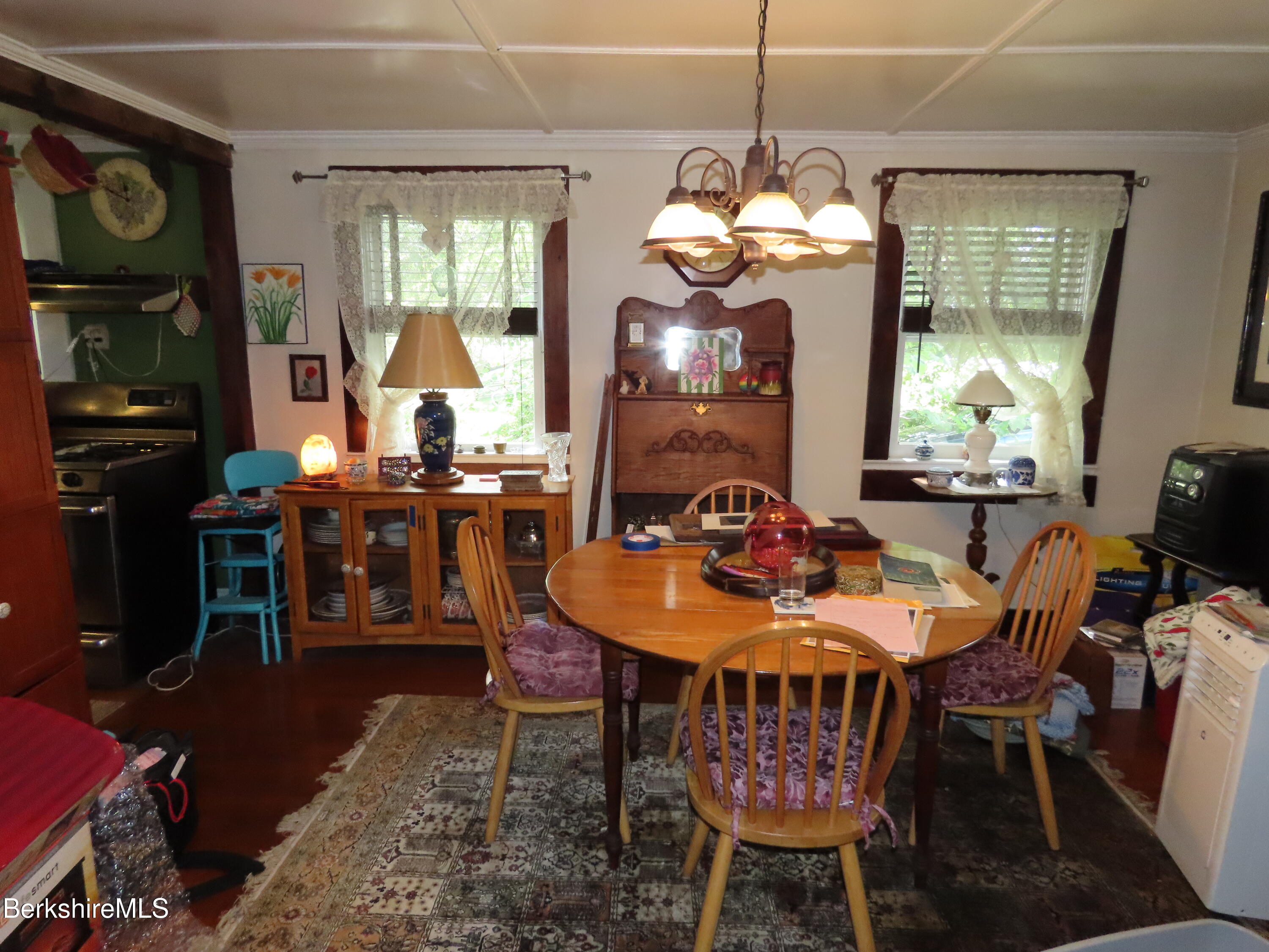 1138 Main Road Stamford, VT 05352 - Photo 7 of 46 a view of a dining room with furniture window and wooden floor