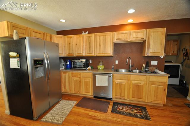 36825 East Jones Road Yoder, CO 80864 - Photo 10 of 35 View toward refrigerator and sink areas.